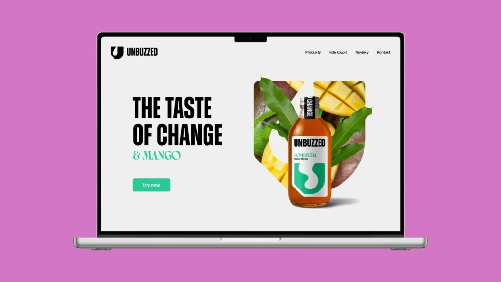 Mockup webstránky UNBUZZED s produktovou fľašou a claimom The Taste of Change na notebooku